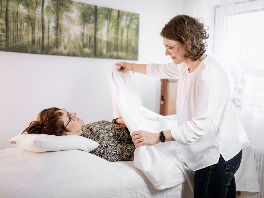 Geborgenheit Den Klienten zudecken.